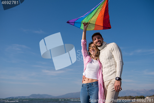 Image of Couple enjoying time together at beach