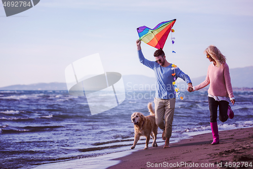 Image of happy couple enjoying time together at beach