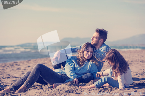 Image of Young family enjoying vecation during autumn