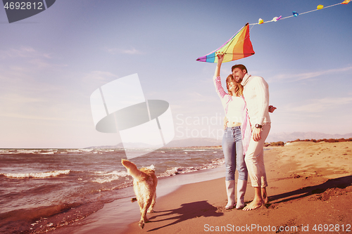 Image of happy couple enjoying time together at beach