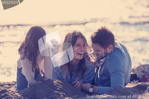 Image of Young family enjoying vecation during autumn