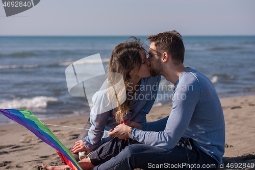 Image of Couple enjoying time together at beach