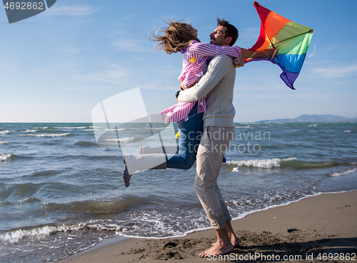 Image of Couple enjoying time together at beach