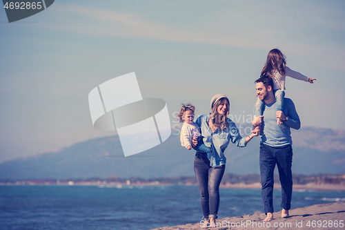 Image of Young family enjoying vecation during autumn