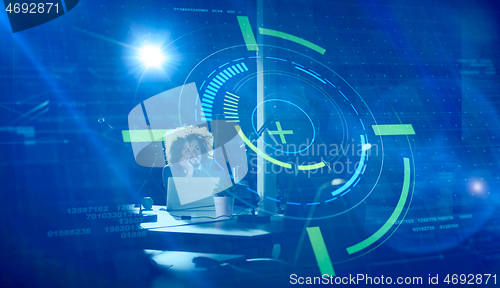 Image of businessman relaxing at the desk