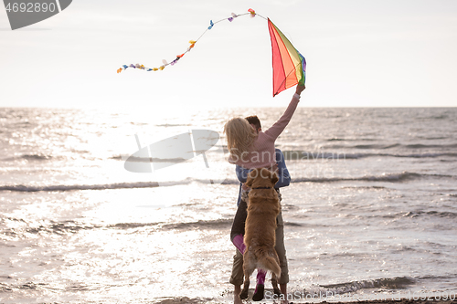 Image of happy couple enjoying time together at beach