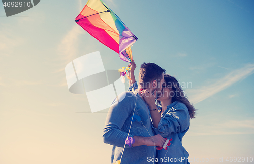 Image of Couple enjoying time together at beach