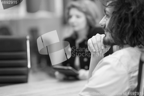 Image of Startup Business Team At A Meeting at modern office building