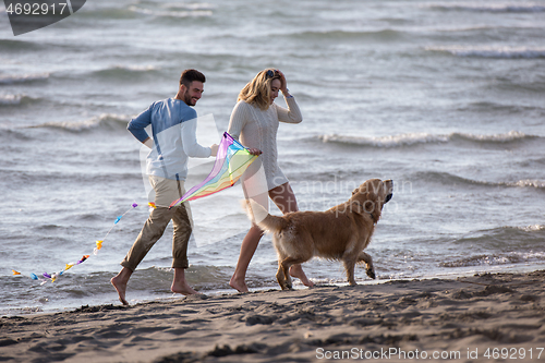 Image of happy couple enjoying time together at beach