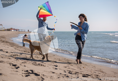 Image of happy young family enjoying vecation during autumn day