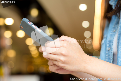 Image of Woman hold with cellphone