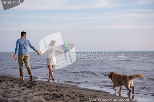 Image of happy couple enjoying time together at beach