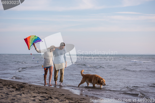 Image of happy couple enjoying time together at beach