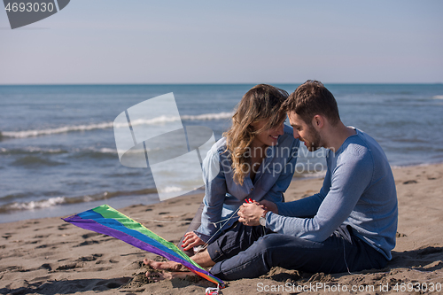 Image of Couple enjoying time together at beach