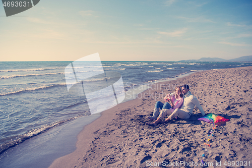 Image of young couple enjoying time together at beach