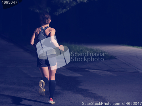 Image of female runner training for marathon