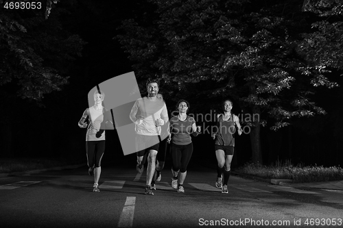 Image of runners team on the night training