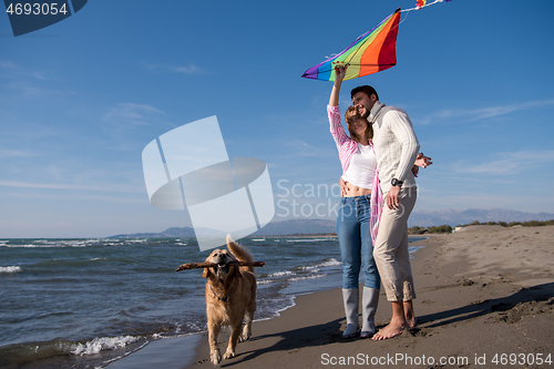 Image of happy couple enjoying time together at beach