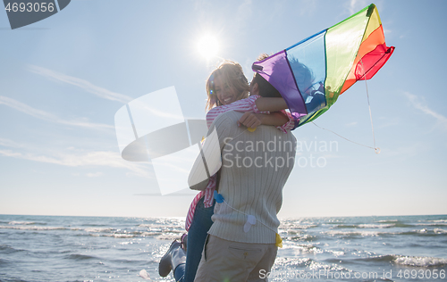 Image of Couple enjoying time together at beach