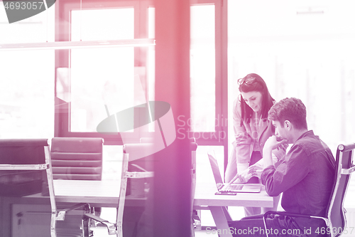 Image of Business People Working With laptop in office