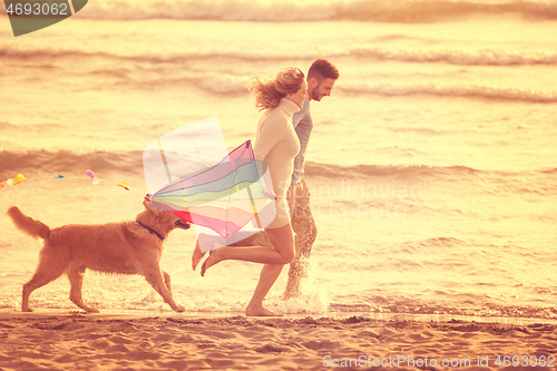 Image of happy couple enjoying time together at beach