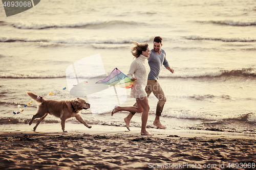 Image of happy couple enjoying time together at beach