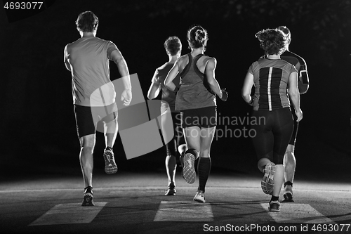 Image of runners team on the night training