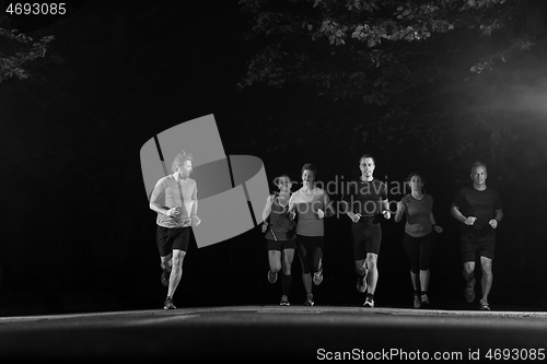 Image of runners team on the night training