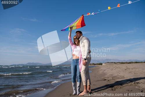 Image of Couple enjoying time together at beach