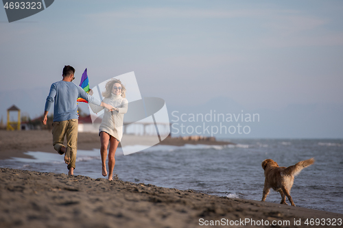 Image of happy couple enjoying time together at beach