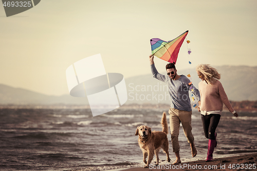 Image of happy couple enjoying time together at beach