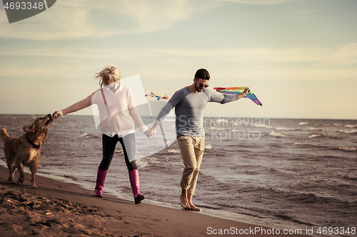 Image of happy couple enjoying time together at beach