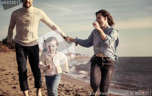 Image of Young family enjoying vecation during autumn