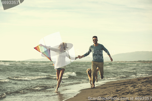 Image of happy couple enjoying time together at beach