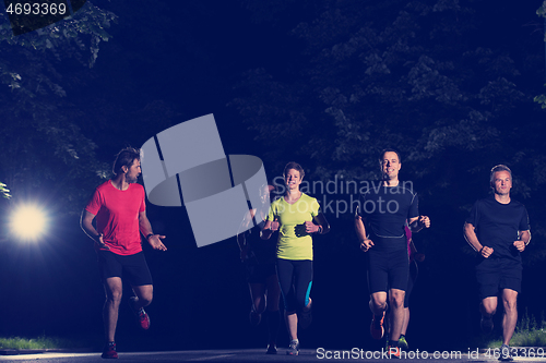 Image of runners team on the night training