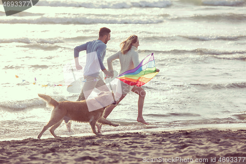 Image of happy couple enjoying time together at beach