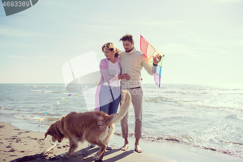 Image of happy couple enjoying time together at beach