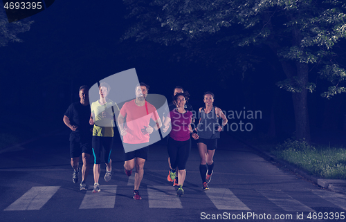 Image of runners team on the night training