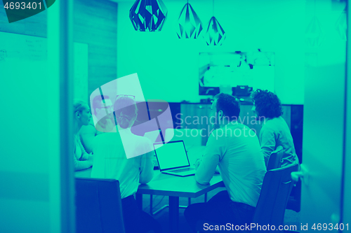 Image of Startup Business Team At A Meeting at modern office building