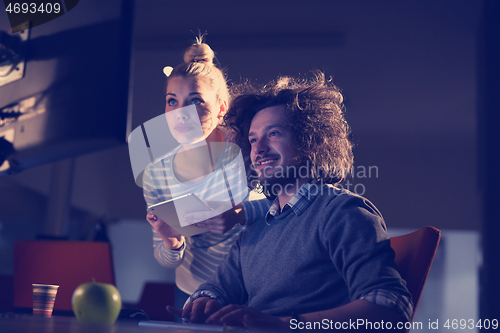 Image of young designers in the night office