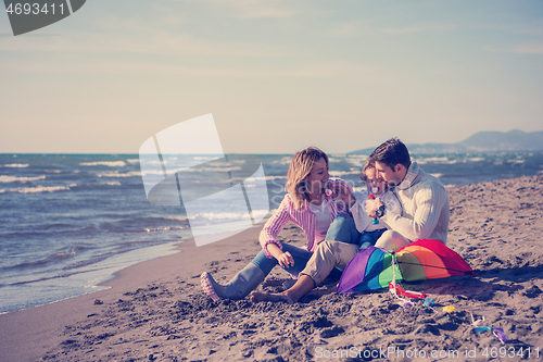 Image of family enjoying vecation during autumn day