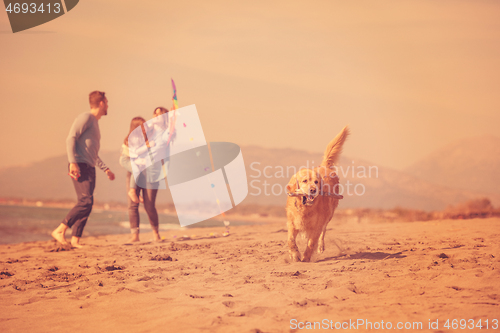 Image of happy young family enjoying vecation during autumn day