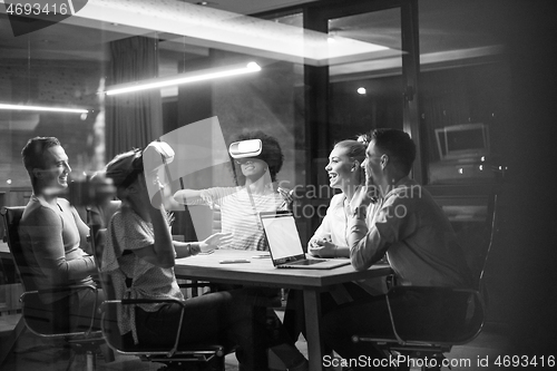 Image of Multiethnic Business team using virtual reality headset