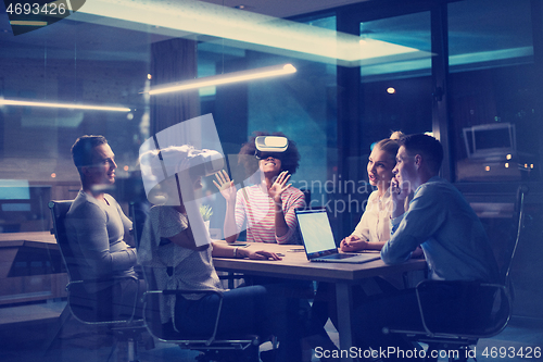 Image of Multiethnic Business team using virtual reality headset