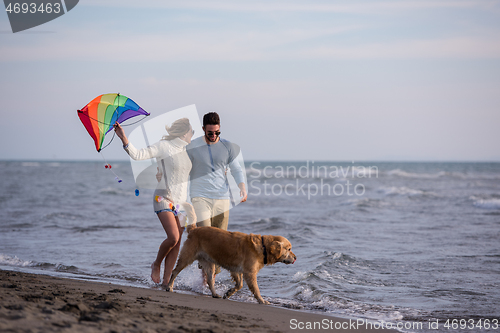 Image of happy couple enjoying time together at beach