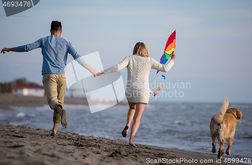 Image of happy couple enjoying time together at beach