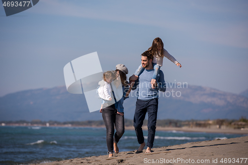 Image of Young family enjoying vecation during autumn