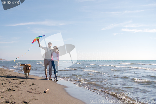 Image of happy couple enjoying time together at beach