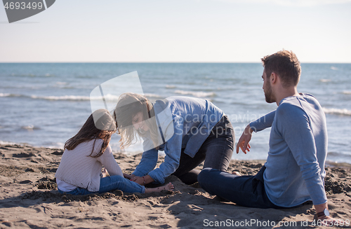 Image of Young family enjoying vecation during autumn