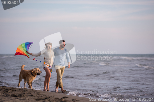 Image of happy couple enjoying time together at beach